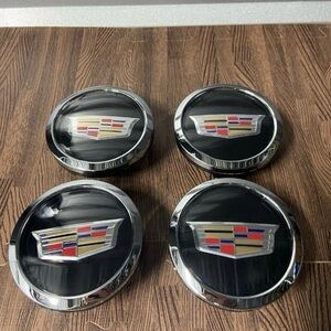 4 CADILLAC BLACK CHROME EMBLEM CENTER CAPS FLOATING SPINNER
CAPS WH3.18 NEW